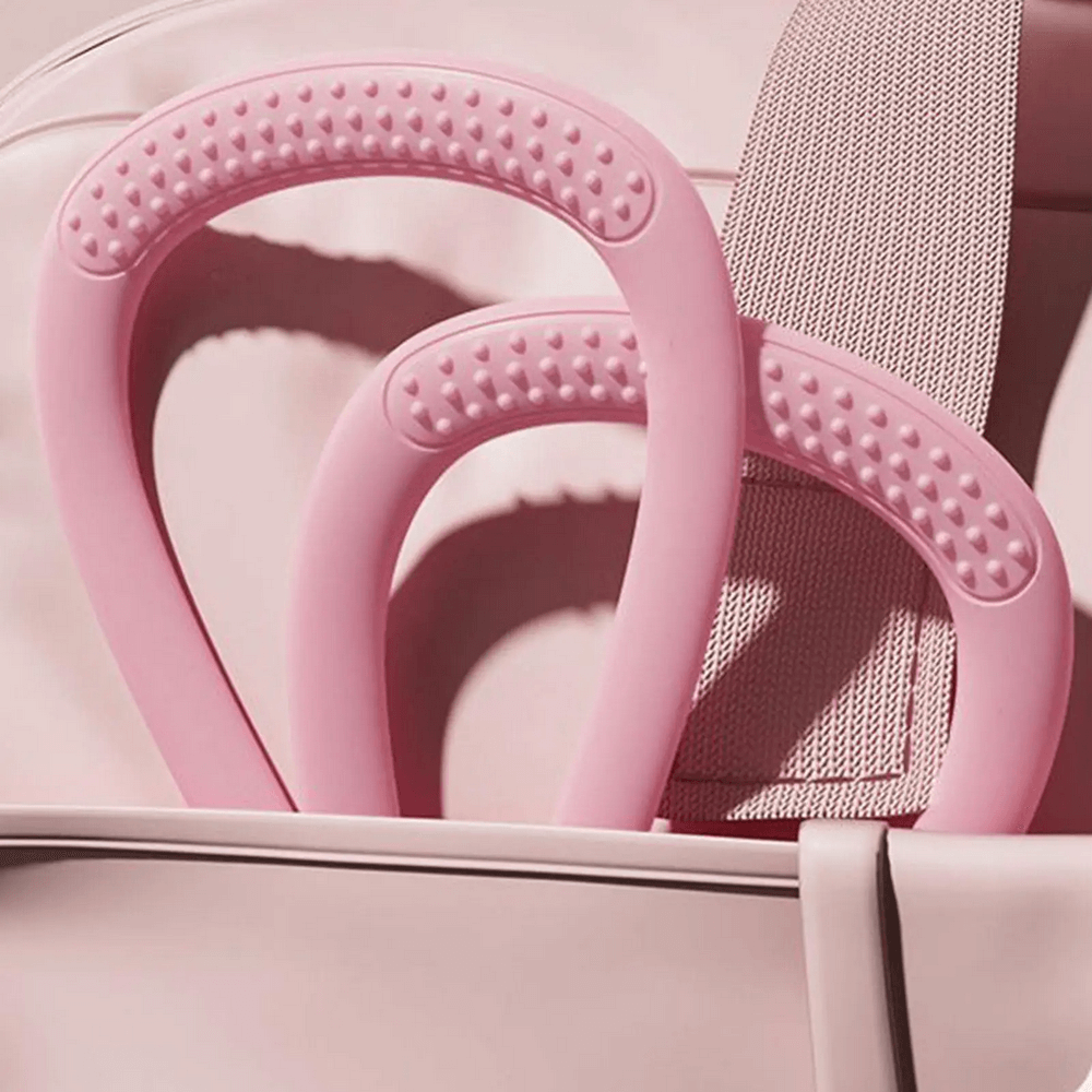 Alt Tag: Pink figure 8 silicone resistance bands in bag, perfect for arm, back, and shoulder workouts. Lightweight and portable.