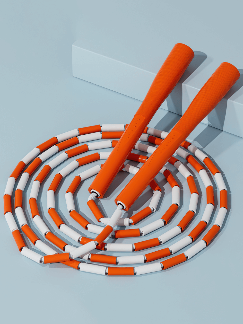 Orange and white beaded jump rope for fitness workouts, made with durable ABS and PPS materials. Ideal for weight loss and exercise.