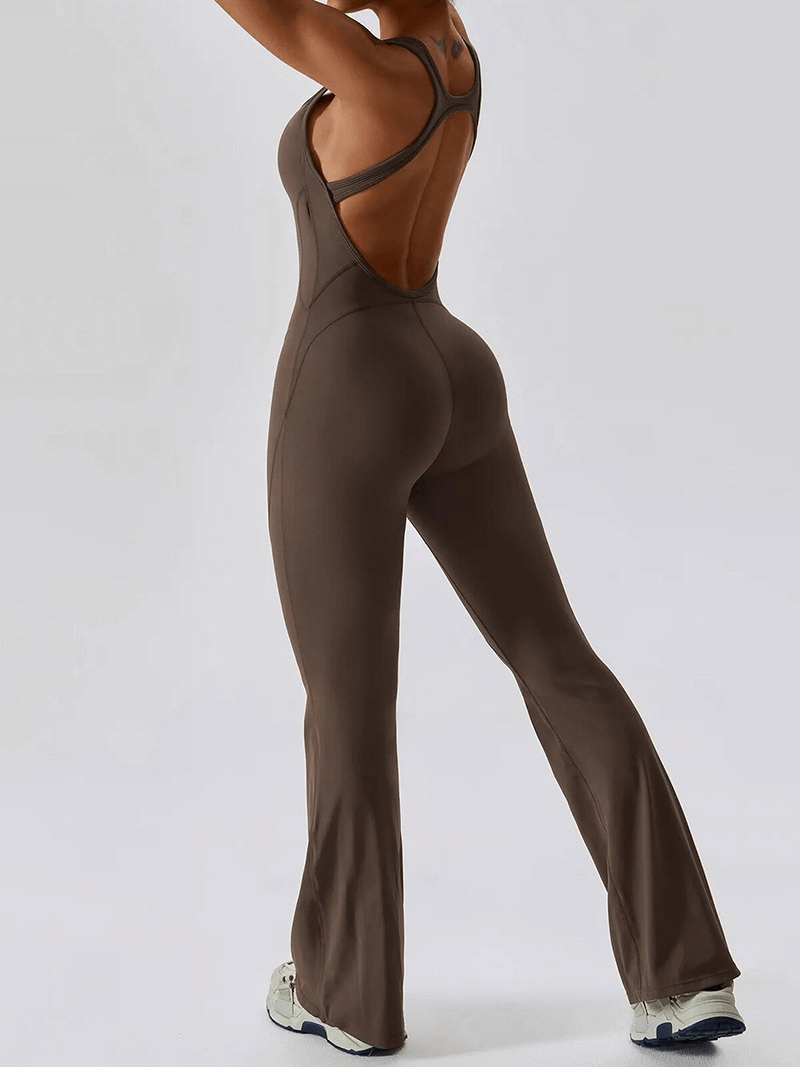 Woman wearing open back fitness jumpsuit SF1597, highlighting comfort and flexibility for yoga, running, and gym workouts.
