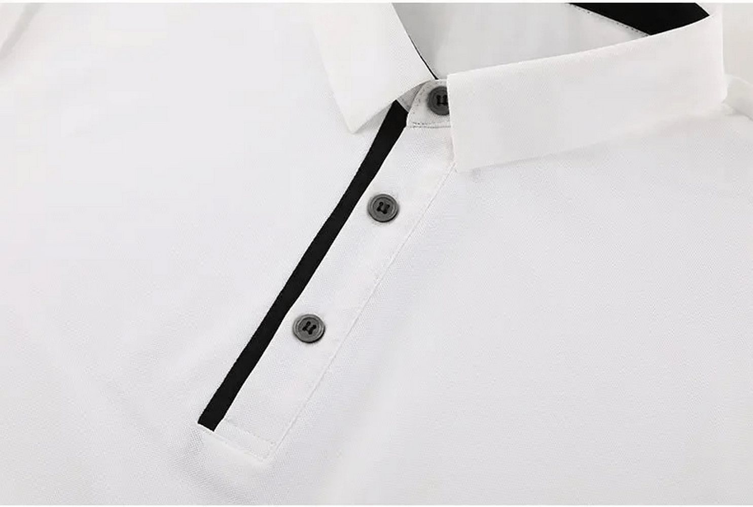 Close-up of a white men's fitness polo t-shirt with black button detail, ideal for spring, summer, and autumn fashion. Model SF2202.