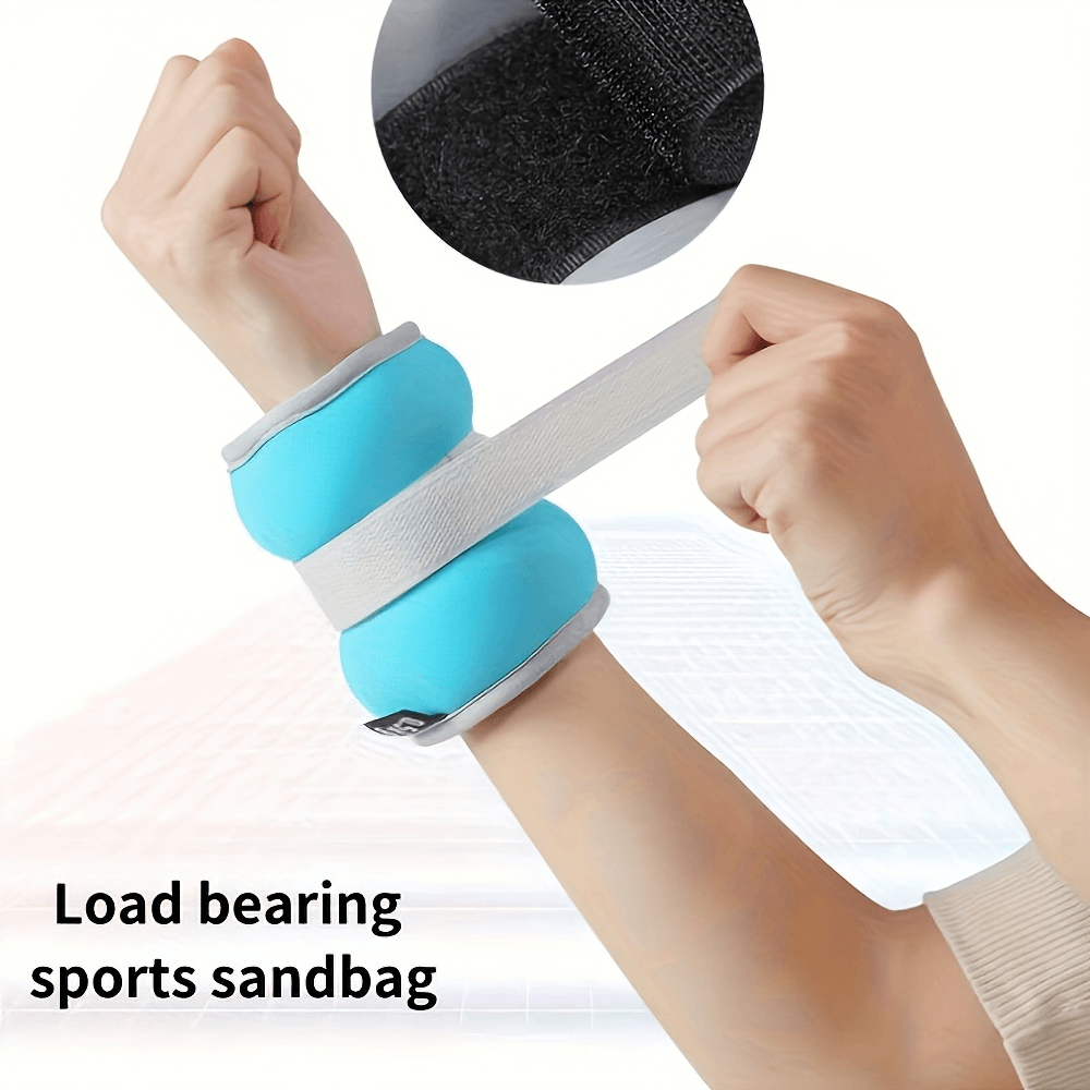 Adjustable blue wrist weight strap with secure hook-and-loop closure for fitness training and rehab exercises.