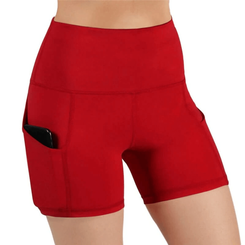 Red high-waist women's fitness shorts with phone pockets, made from stretchy polyester for a comfortable fit during any activity.