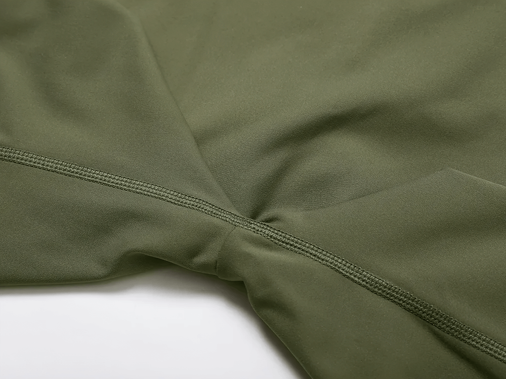 Close-up of green yoga pants with scrunch design showcasing high-quality stitching and breathable fabric for style and comfort.