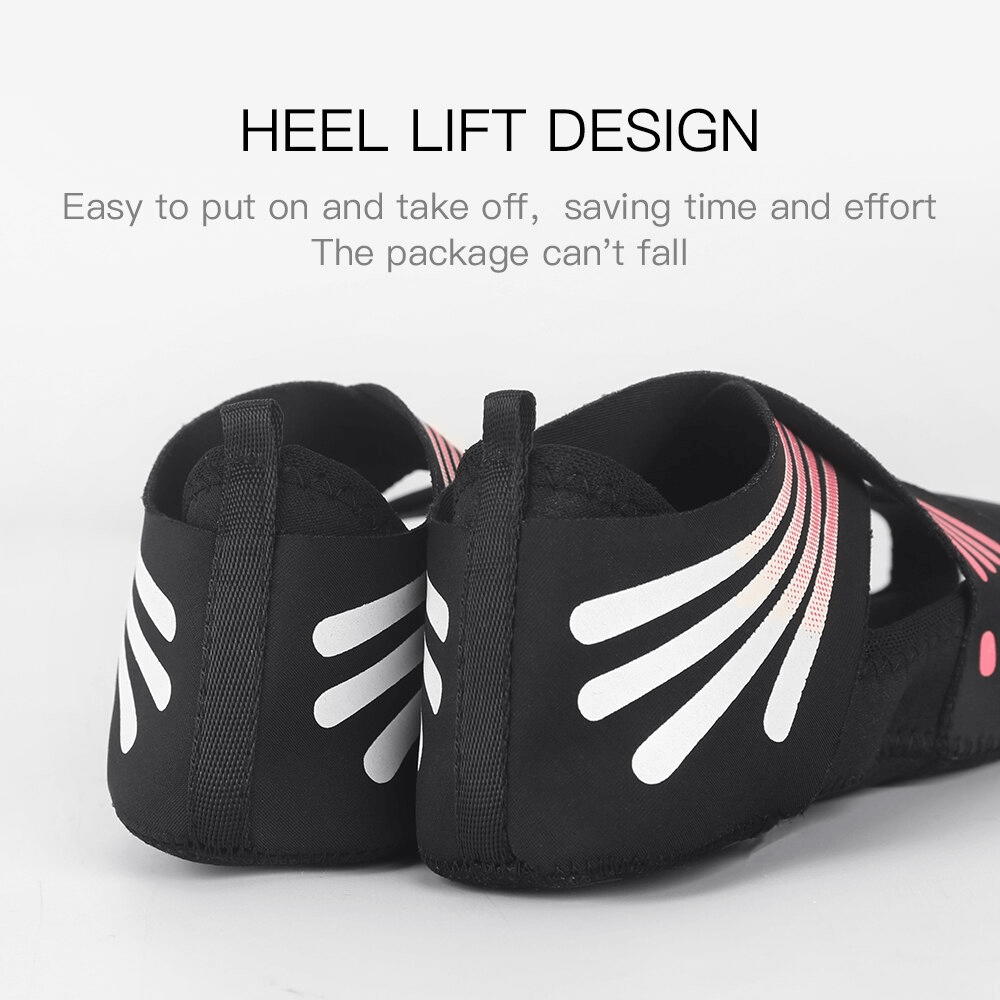 Heel lift design on black women's anti-slip shoe socks for yoga and pilates, showcasing easy slip-on feature with white and pink detailing.