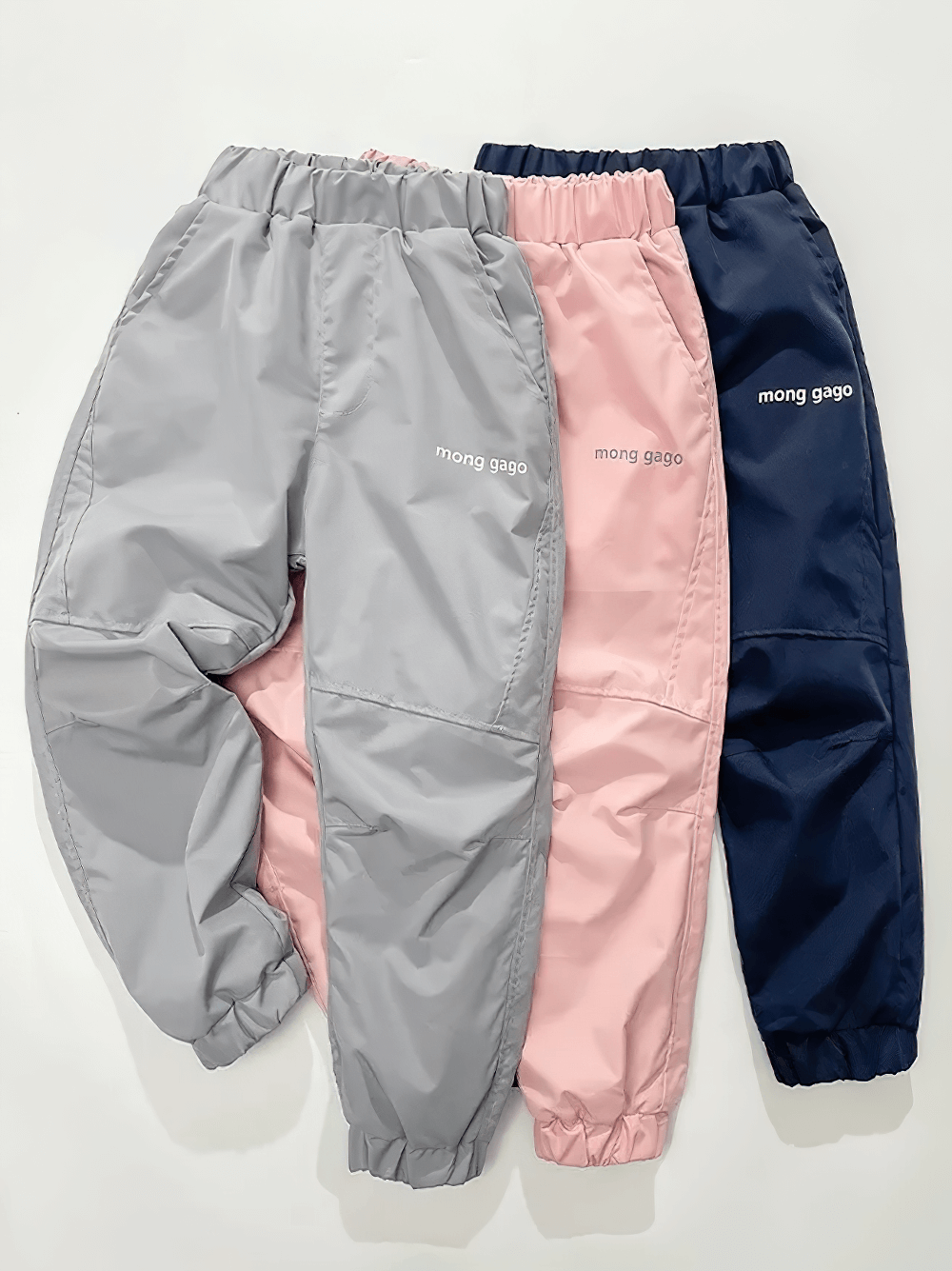 Fleece Lined Waterproof Cotton Down Pants - SF3782 in gray, pink, and navy color options for girls and boys, perfect for winter activities.