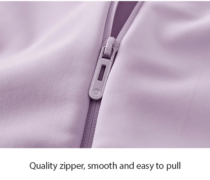 Close-up of a high-quality softshell hiking jacket zipper, designed for smooth and easy use. Water-resistant and durable.