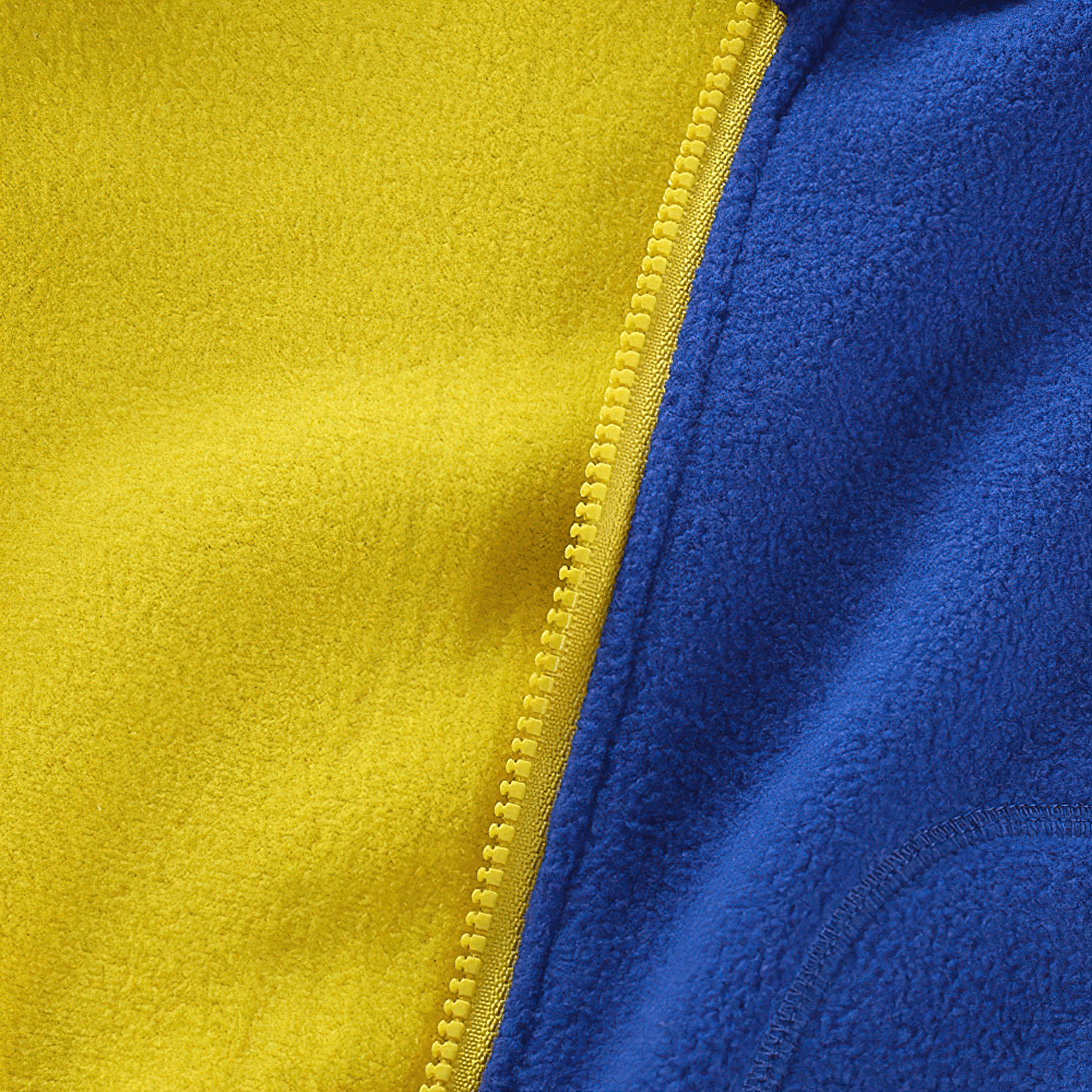 Close-up of colorful Fleece Zip Jacket with Stand Collar and Pockets - SF3568 showing yellow and blue contrast fleece fabric.