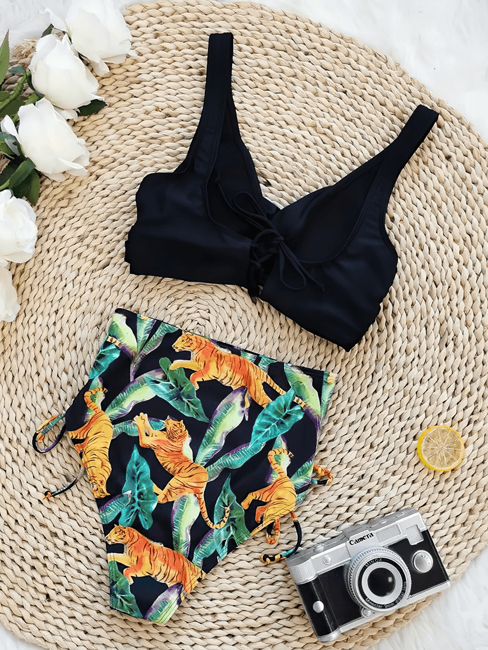 Floral Print V-Neck Tie Back High Waist Swimwear - SF4680 displayed on a woven mat with flowers and a vintage camera.