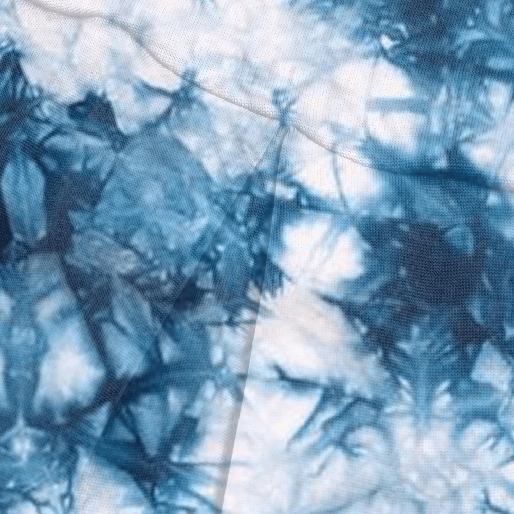 Floral Tennis Skort with Inner Shorts for Women - SF4394 close-up of blue floral print fabric, sporty pleated skort style