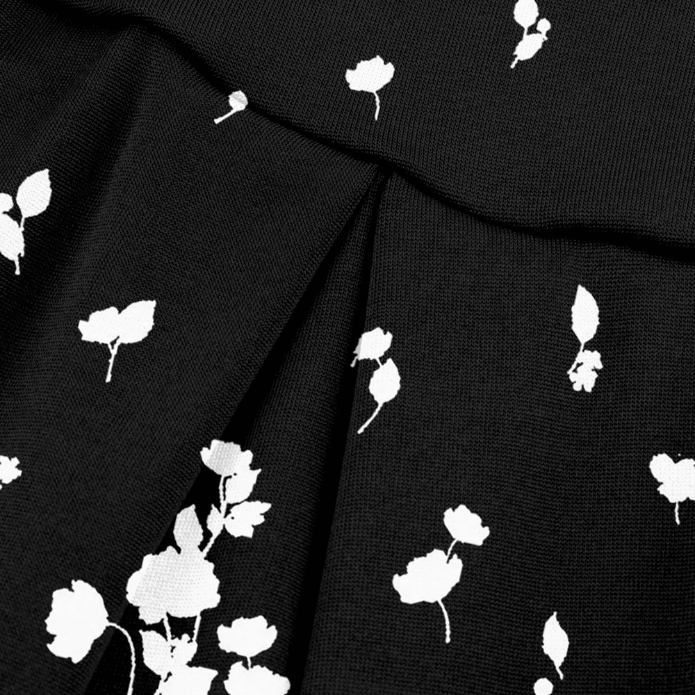 Alt Tag: Floral Tennis Skort with Inner Shorts for Women - SF4394 black pleated wrap skort close-up with white floral print
