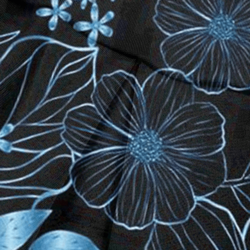 Alt Tag: Floral Tennis Skort with Inner Shorts for Women - SF4394 close-up floral print fabric, sporty pleated wrap-style skort