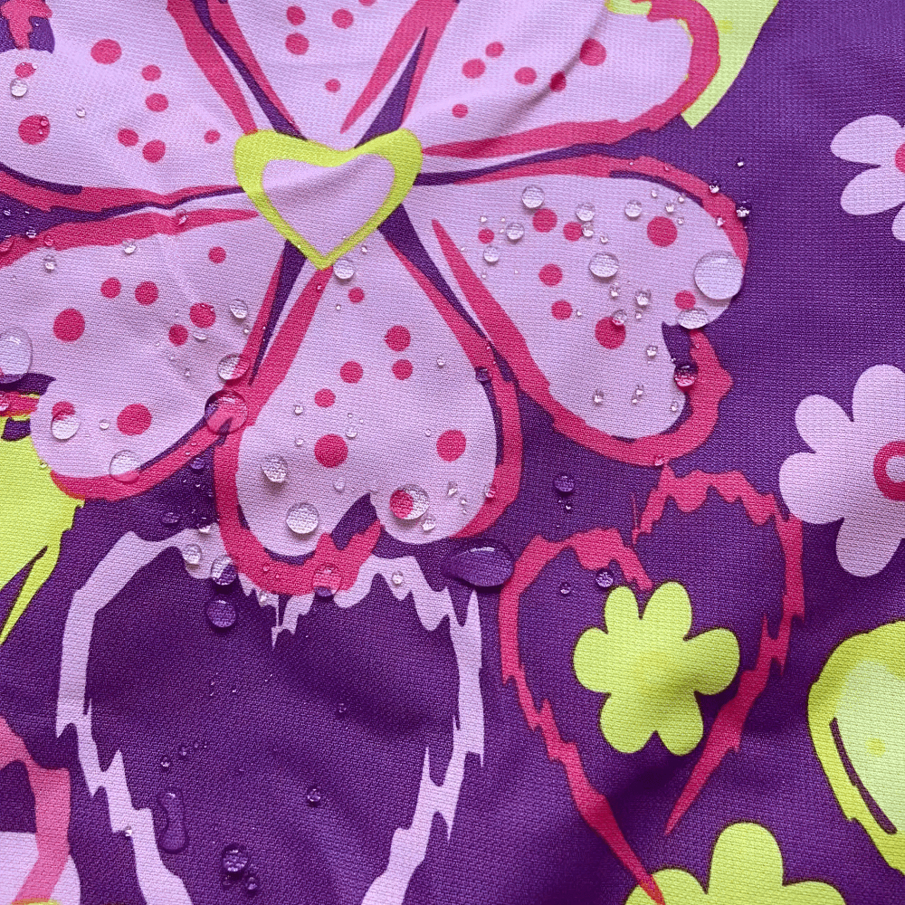 Close-up of Flower Printed Windbreaker Jacket with Polar Fleece - SF3588, featuring a vibrant waterproof floral design.