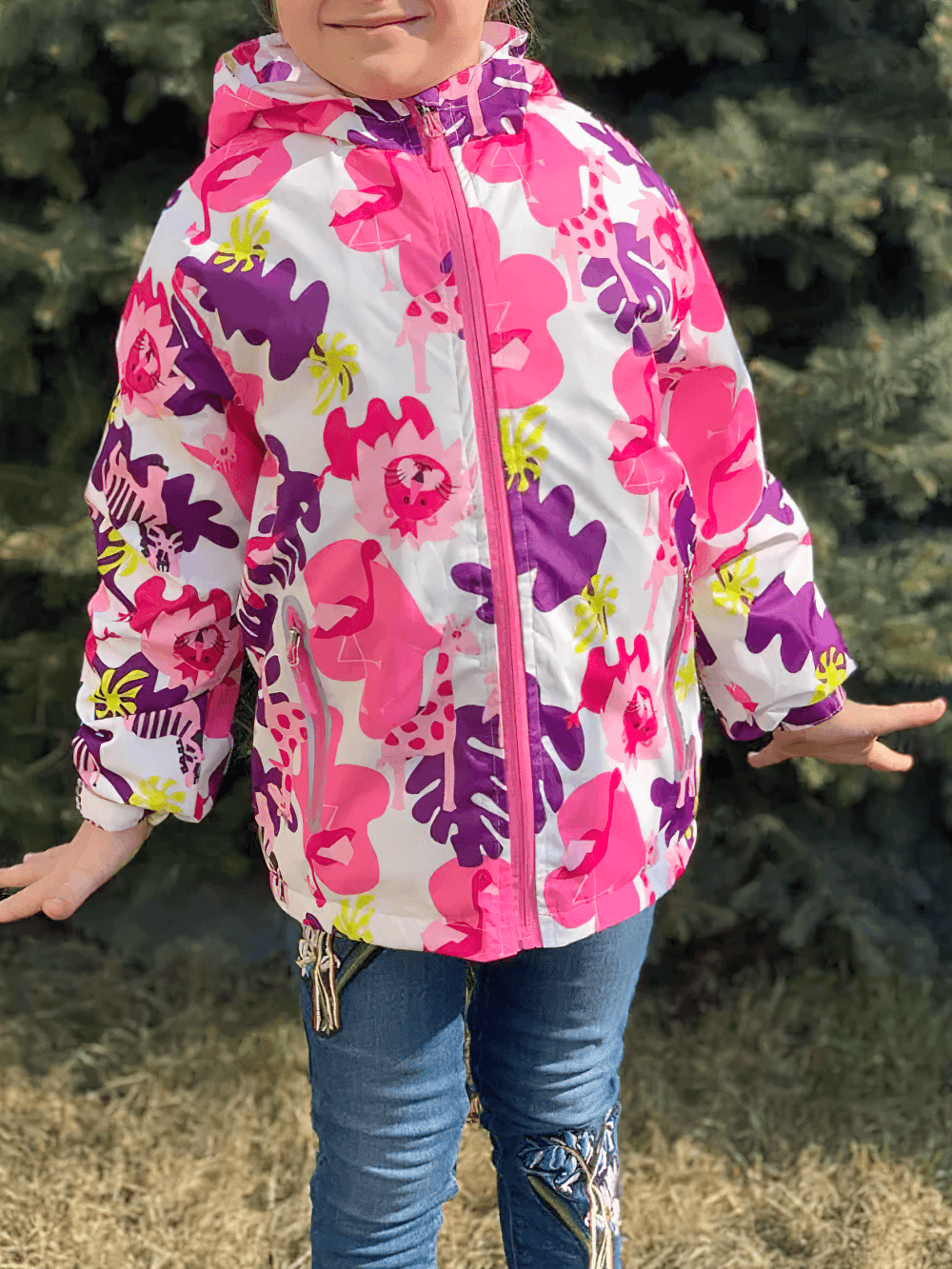 Child wearing Flower Printed Windbreaker Jacket with Polar Fleece - SF3588 in vibrant colors outside.