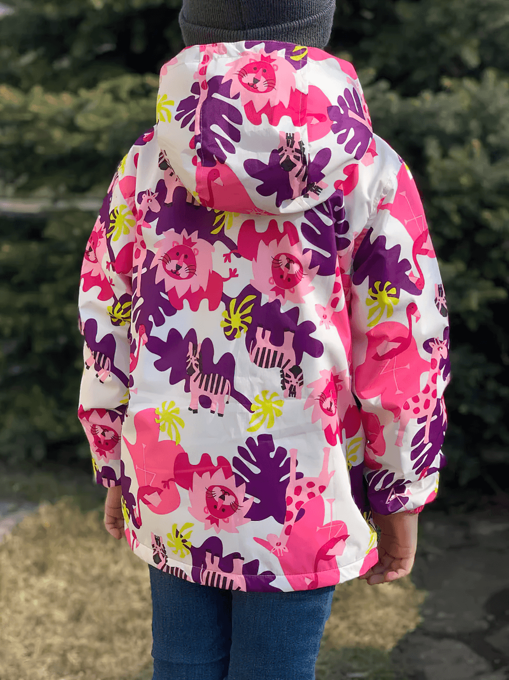 Child wearing Flower Printed Windbreaker Jacket with Polar Fleece - SF3588, featuring vibrant floral design and cozy lining.