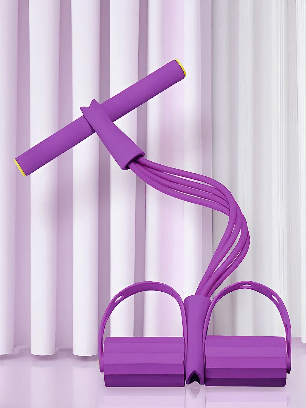 Purple Four-Tube Pedal Resistance Band for yoga and workouts against a purple curtain backdrop.