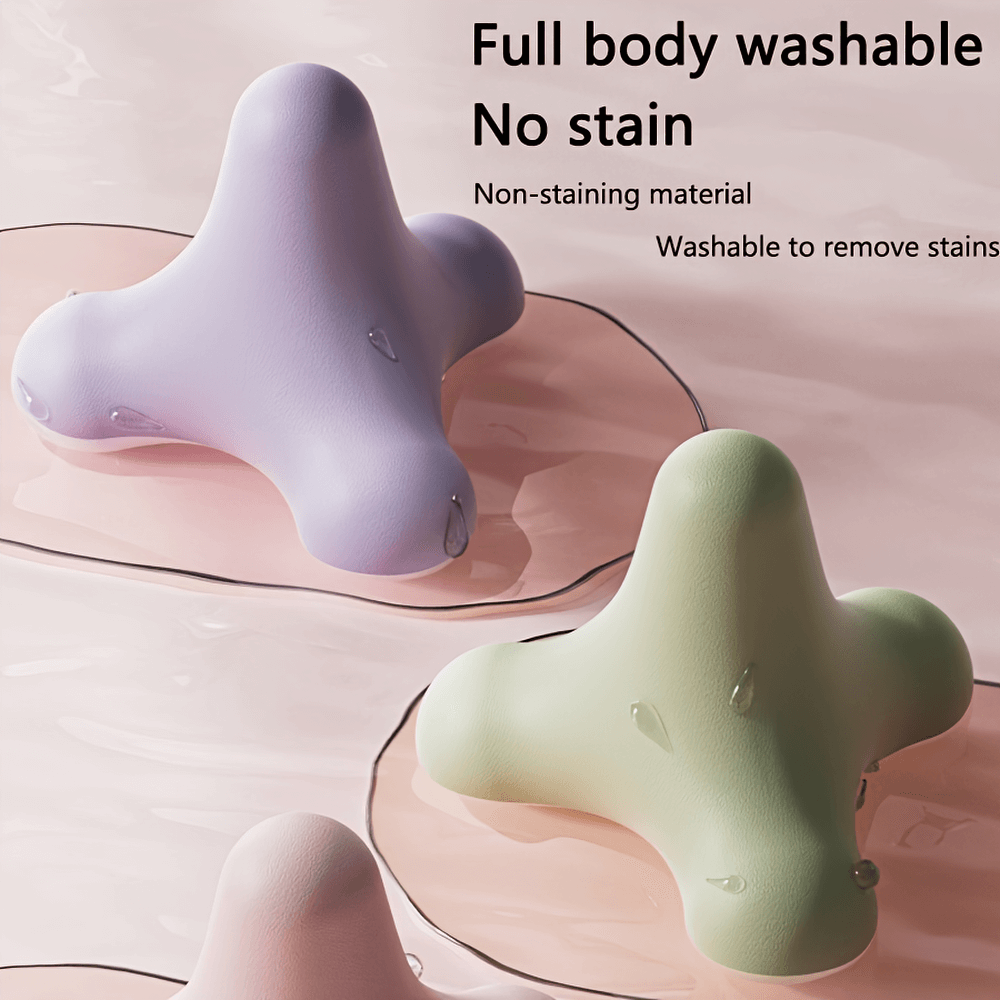 Ergonomic full-body handheld massage tool SF2838 in pastel colors, showcasing non-staining and washable features for deep muscle relief.