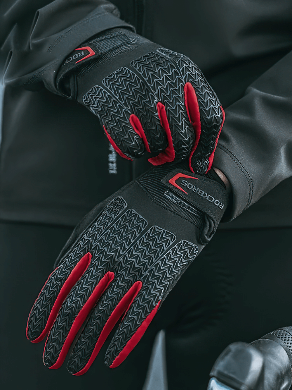 Full finger waterproof cycling gloves with non-slip grip in red and black, perfect for mountain biking and touchscreen use.