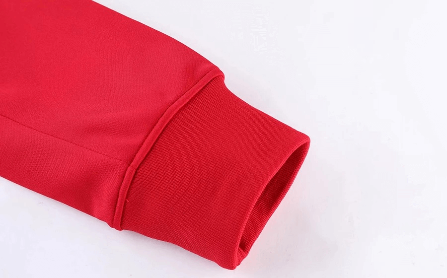 Close-up of red sleeve cuff on Full Zipper Cycling Jersey with Reflective Stripes, showcasing polyester fabric for breathability and durability.
