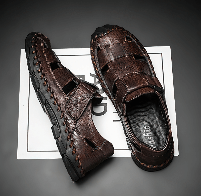 Genuine leather men's sandals with soft soles and hook & loop closure, perfect for outdoor beach adventures and durable comfort.