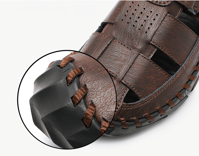 Genuine leather men's sandal with soft sole detail, showcasing durable stitching and rubber outsole for outdoor traction.