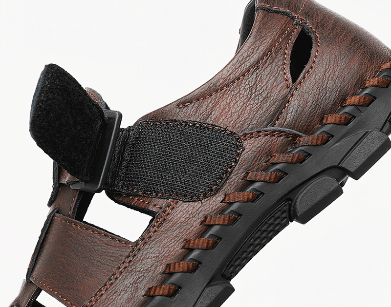 Close-up of Genuine Leather Men's Sandals with soft soles, hook & loop closure, and durable rubber outsole for outdoor comfort.