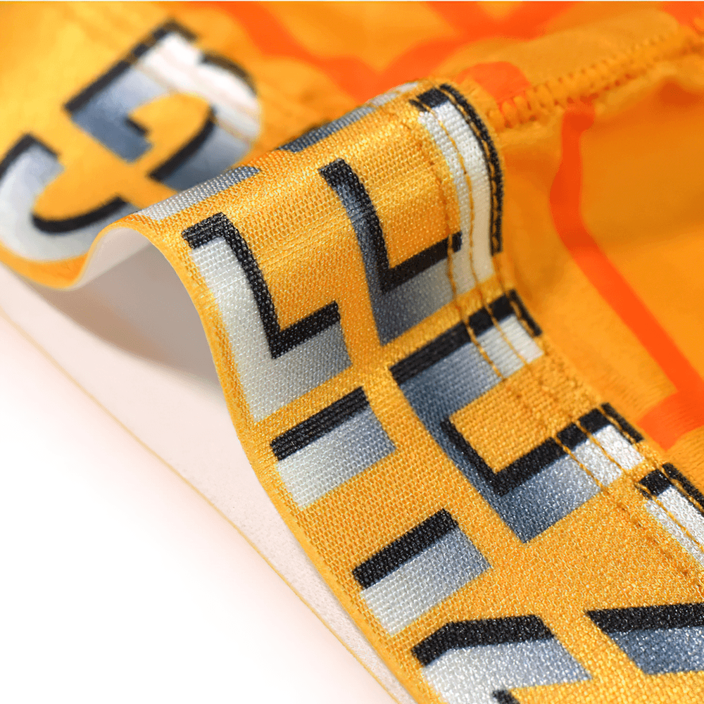 Geometric Long Leg Men's Underwear Boxer Shorts - SF4750 close-up of vibrant orange fabric showing smooth elastic waistband.