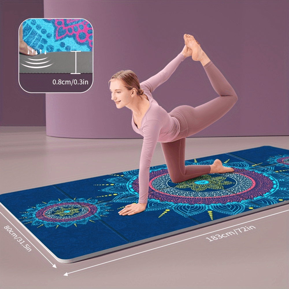 Woman practicing yoga on geometric thick mat, foldable and sweat-absorbent, perfect for fitness and dance. Size 183cm x 80cm.