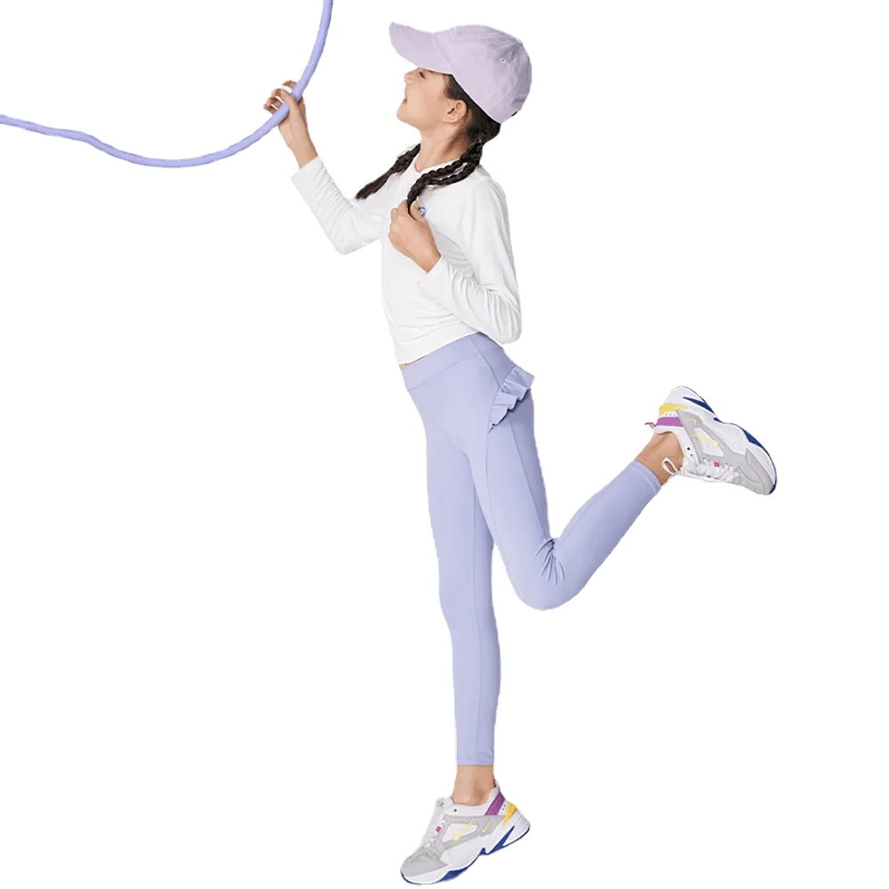Girl jumping rope in Girls Athletic Leggings with Ruffled Waistband - SF3622, showcasing movement and style for dance, yoga, and running.