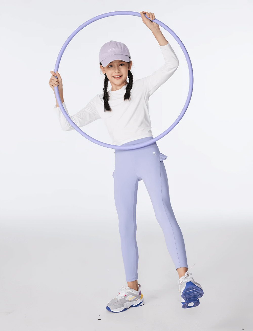 Girl holding a hoop in Girls Athletic Leggings with Ruffled Waistband - SF3622, perfect for yoga and running.