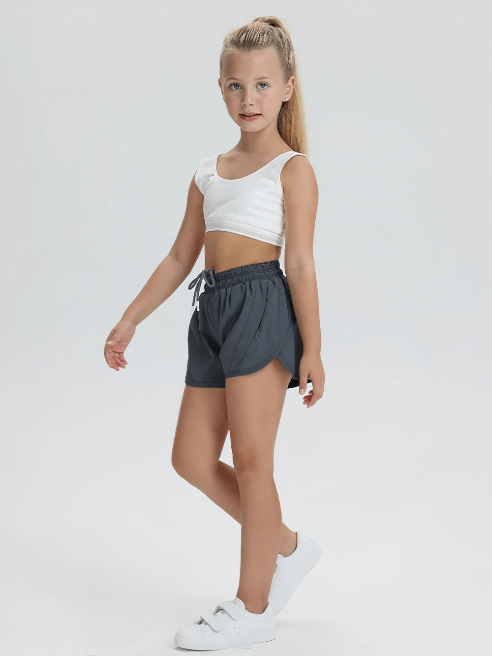 Girl wearing Girls Athletic Running Shorts with Drawstring Fit - SF3769 in gray, perfect for active play and sports.