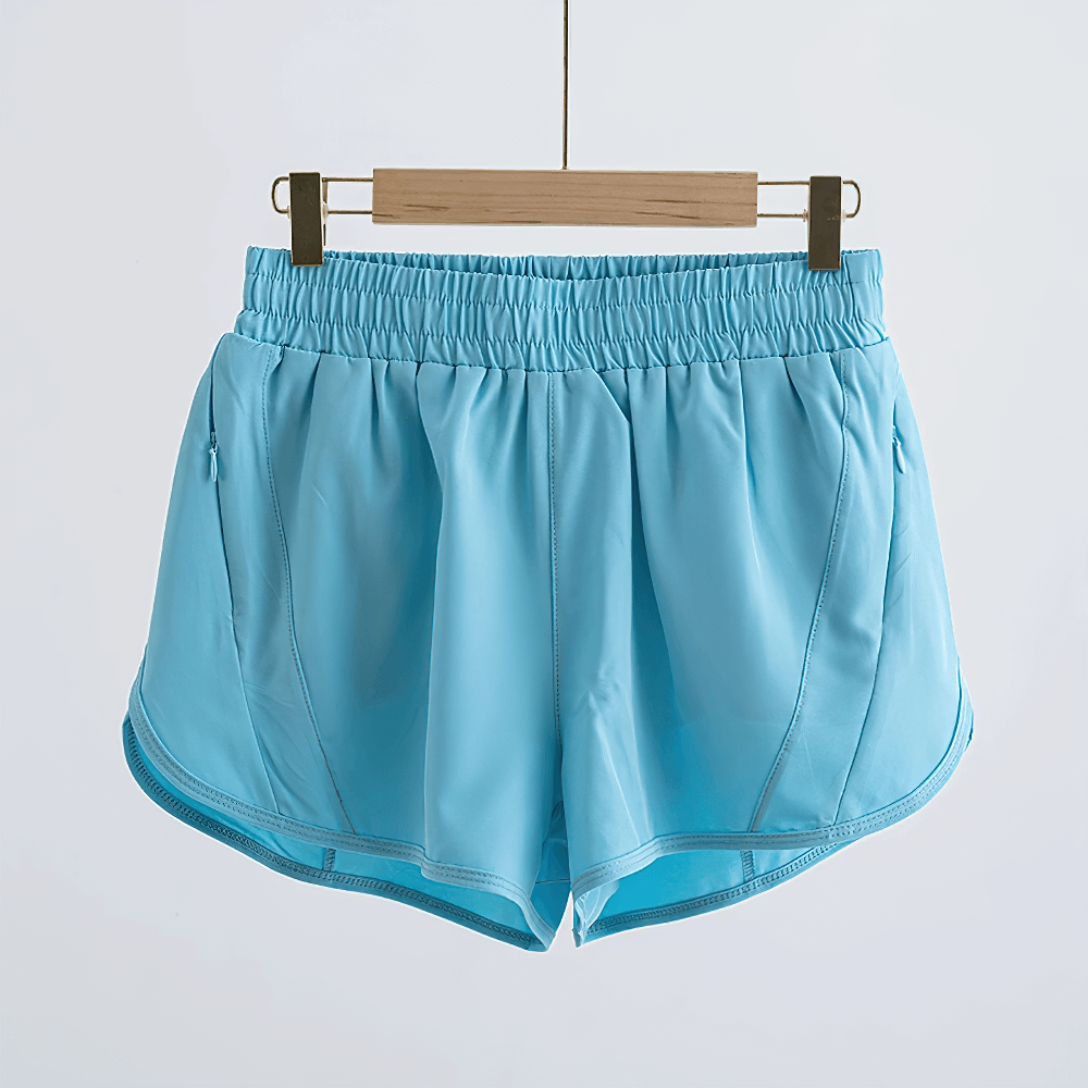 Light blue Girls Athletic Running Shorts with Drawstring Fit - SF3769, featuring breathable fabric and practical pockets.