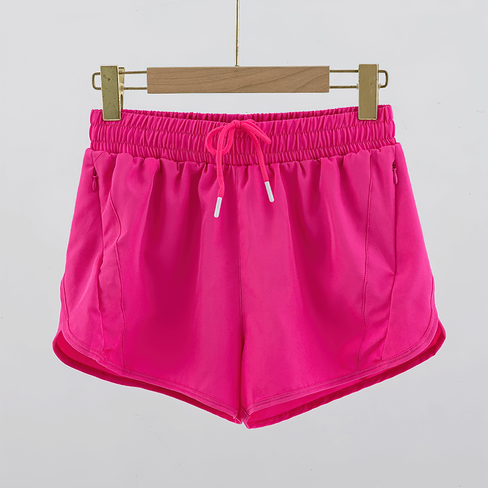 Bright pink Girls Athletic Running Shorts with Drawstring Fit - SF3769, showcasing flexible waist and lightweight fabric.
