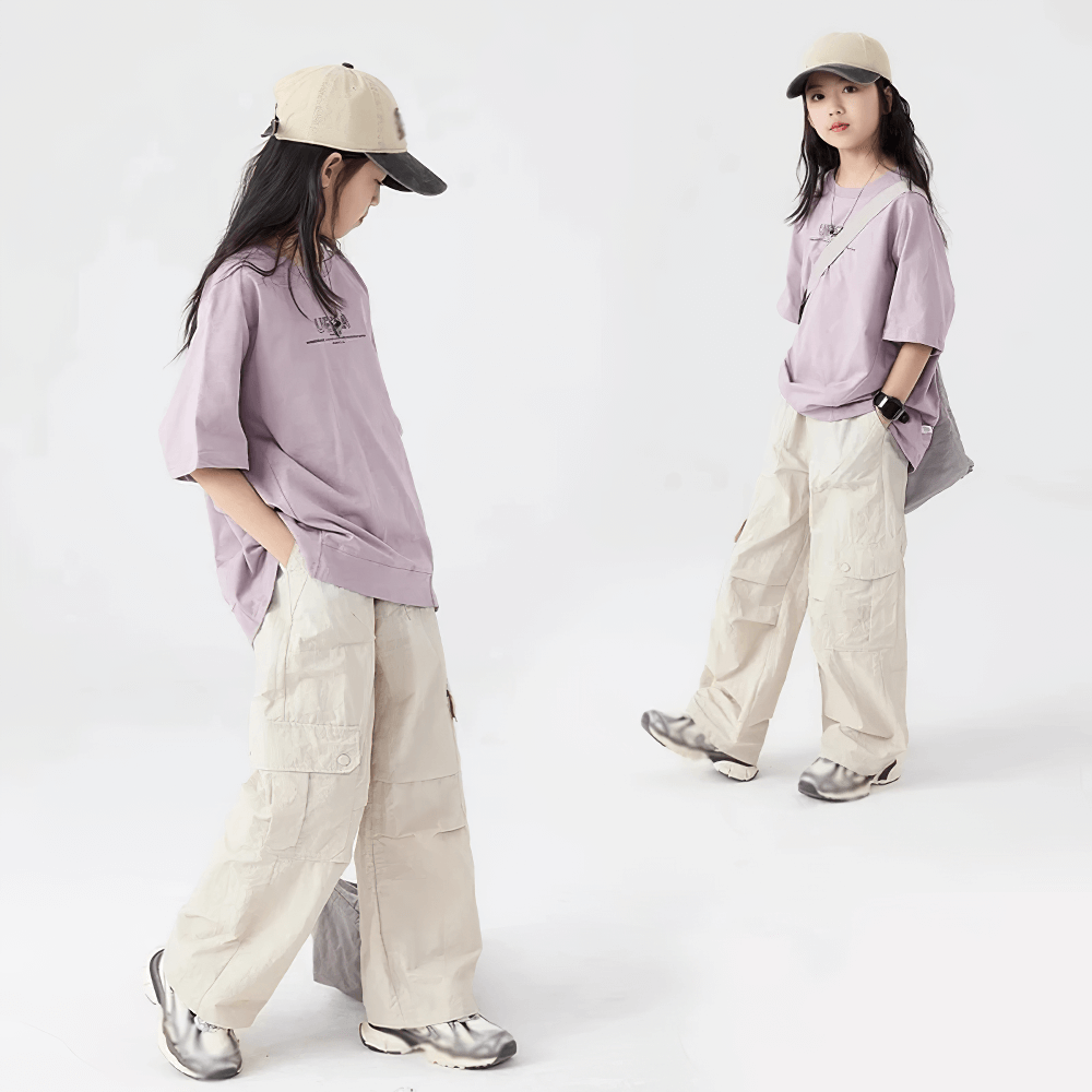 Girls wearing Girls Cargo Pants with Pockets and Elastic Waist - SF3672, showcasing casual sports style and practicality with windproof design.