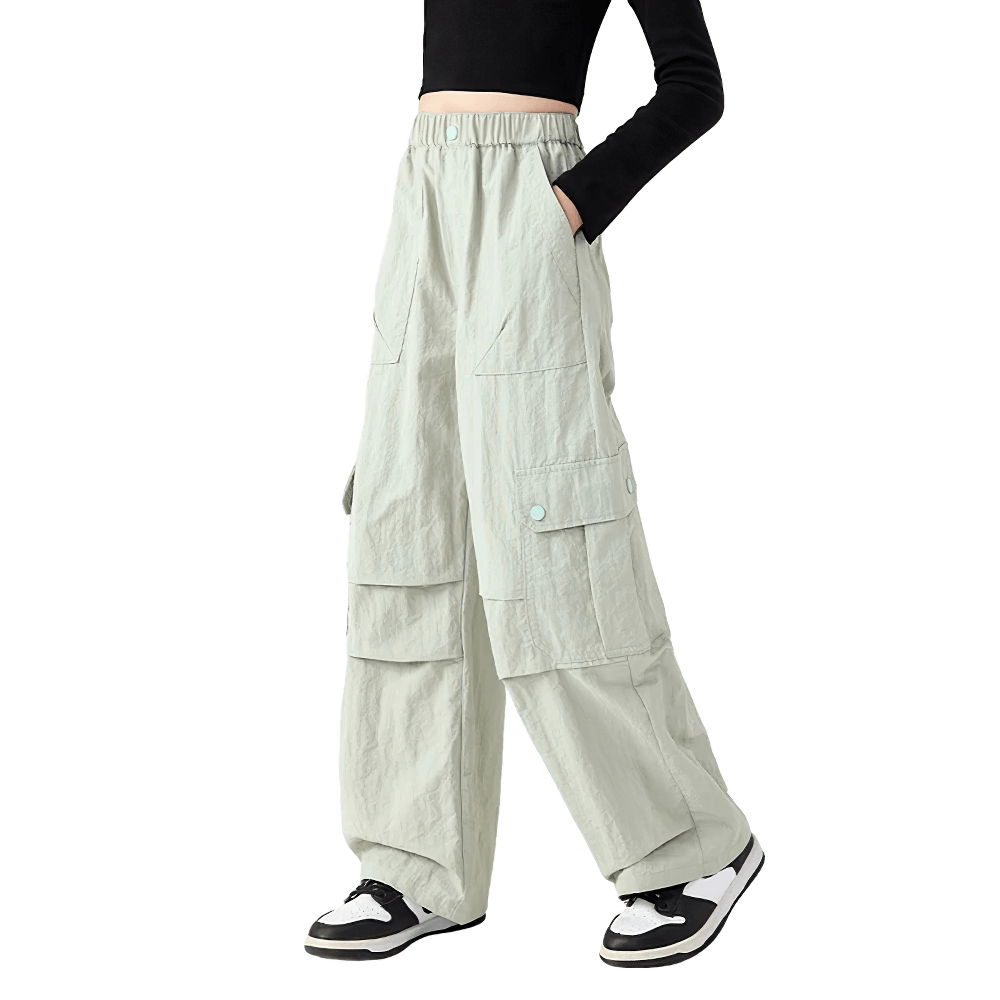 Model wearing Girls Cargo Pants with Pockets and Elastic Waist - SF3672, casual sports windproof trousers with pockets.