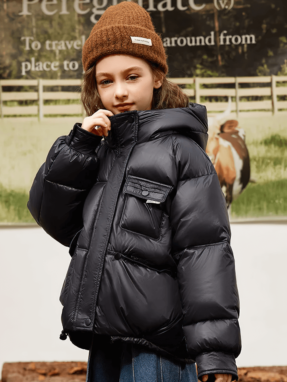Young girl wearing Girls Duck Down Hooded Puffer Jacket With Pockets - SF3522, showcasing warmth and style in a dark puffer coat.