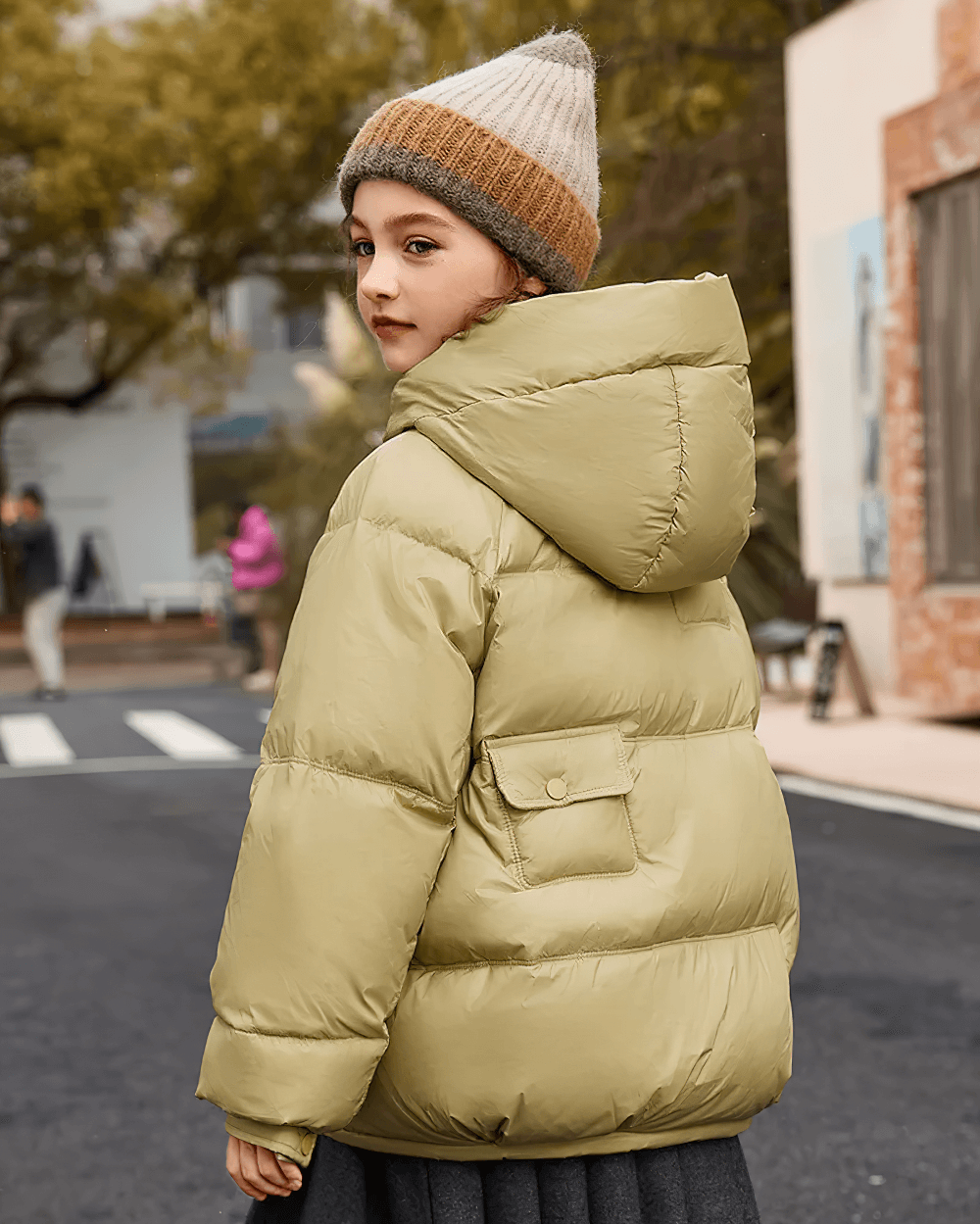 Girl wearing Girls Duck Down Hooded Puffer Jacket With Pockets - SF3522, standing outside in thick, warm coat with hood.