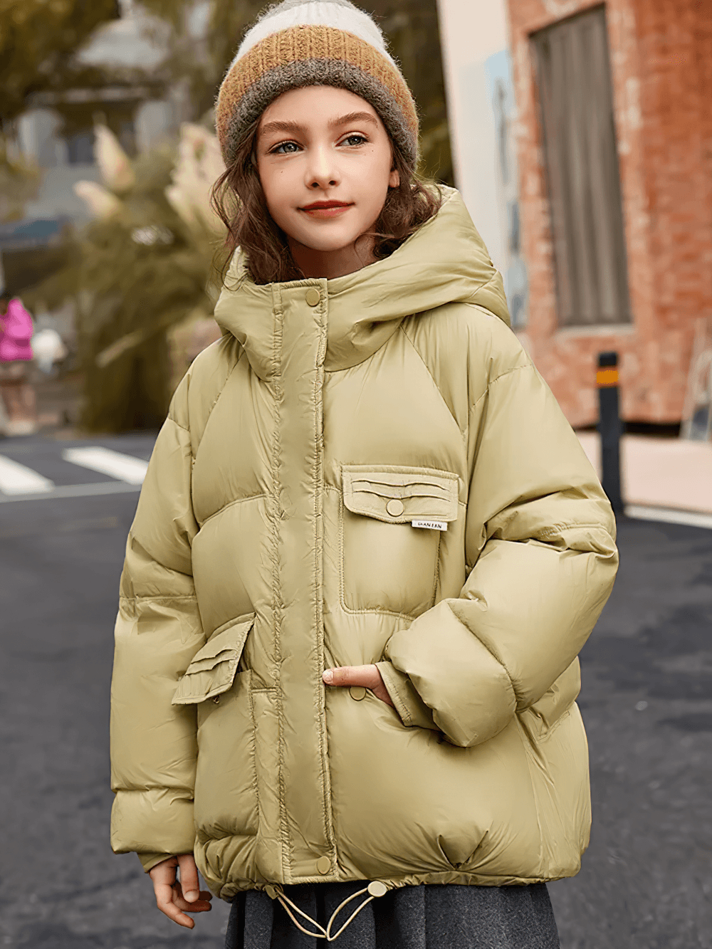 Girl wearing Girls Duck Down Hooded Puffer Jacket With Pockets - SF3522, showcasing cozy warmth and modern style on a winter street.