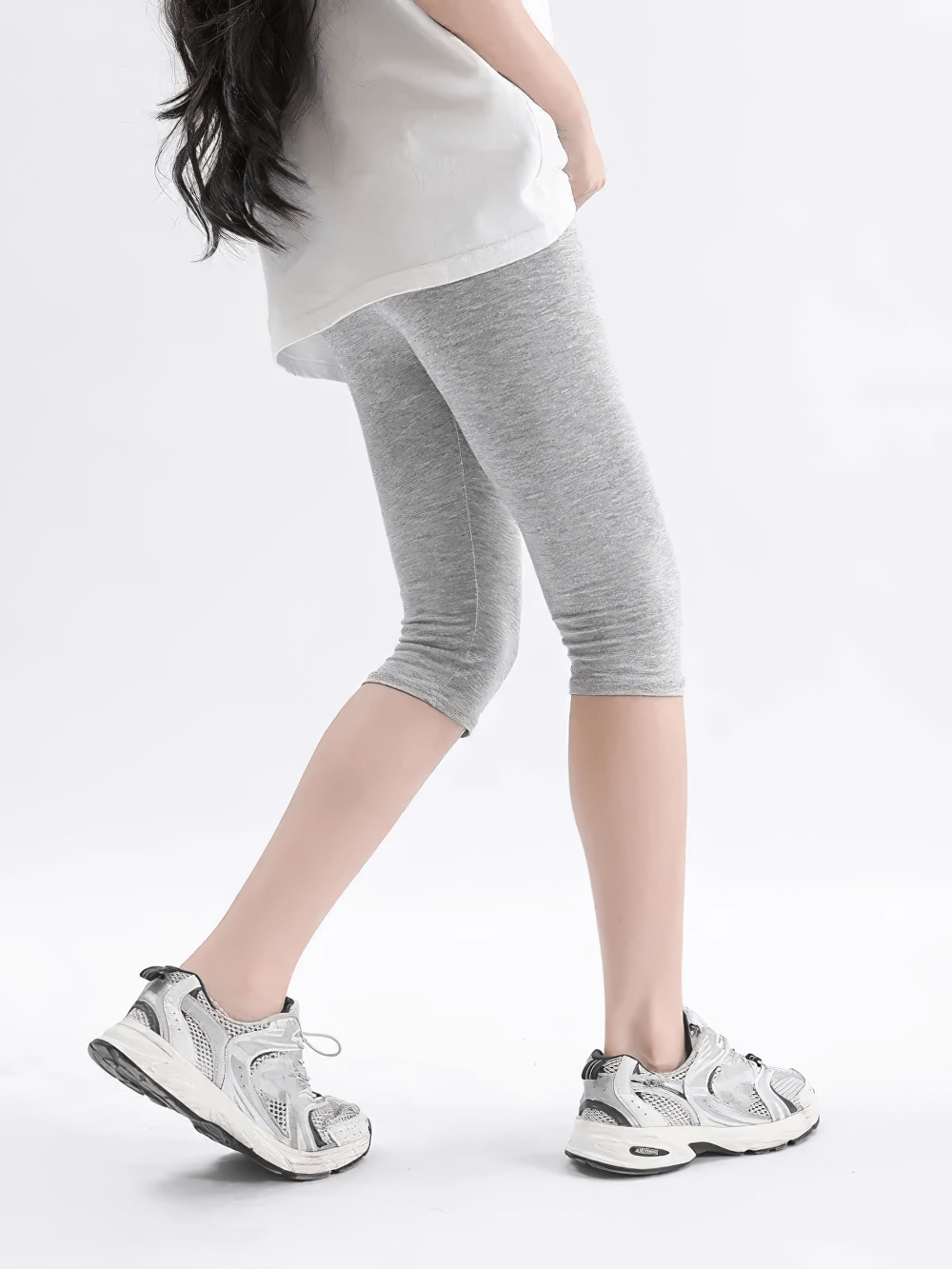 Girl wearing Girls Elastic Sport Capri Shorts for Active Play - SF3877, grey, ideal for training, dance, school, gym, and outdoor activities.