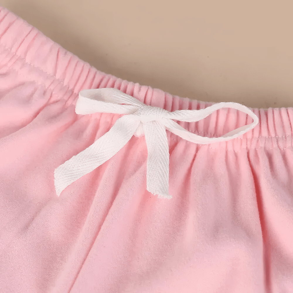 Close-up of pink Girls Elastic Waist Joggers with Side Sporty Stripes - SF3860 featuring a white drawstring and elastic waistband.