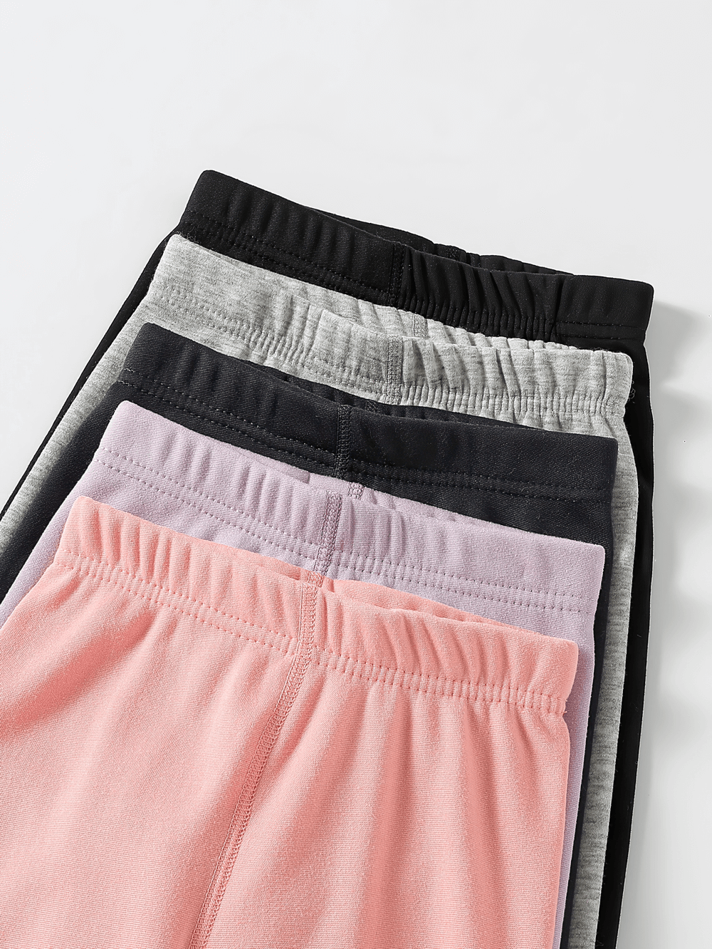 Four pairs of Girls Fleece Leggings for Sports and Casual Wear - SF3660 in pink, lavender, gray, and black, showing the elastic waistband.