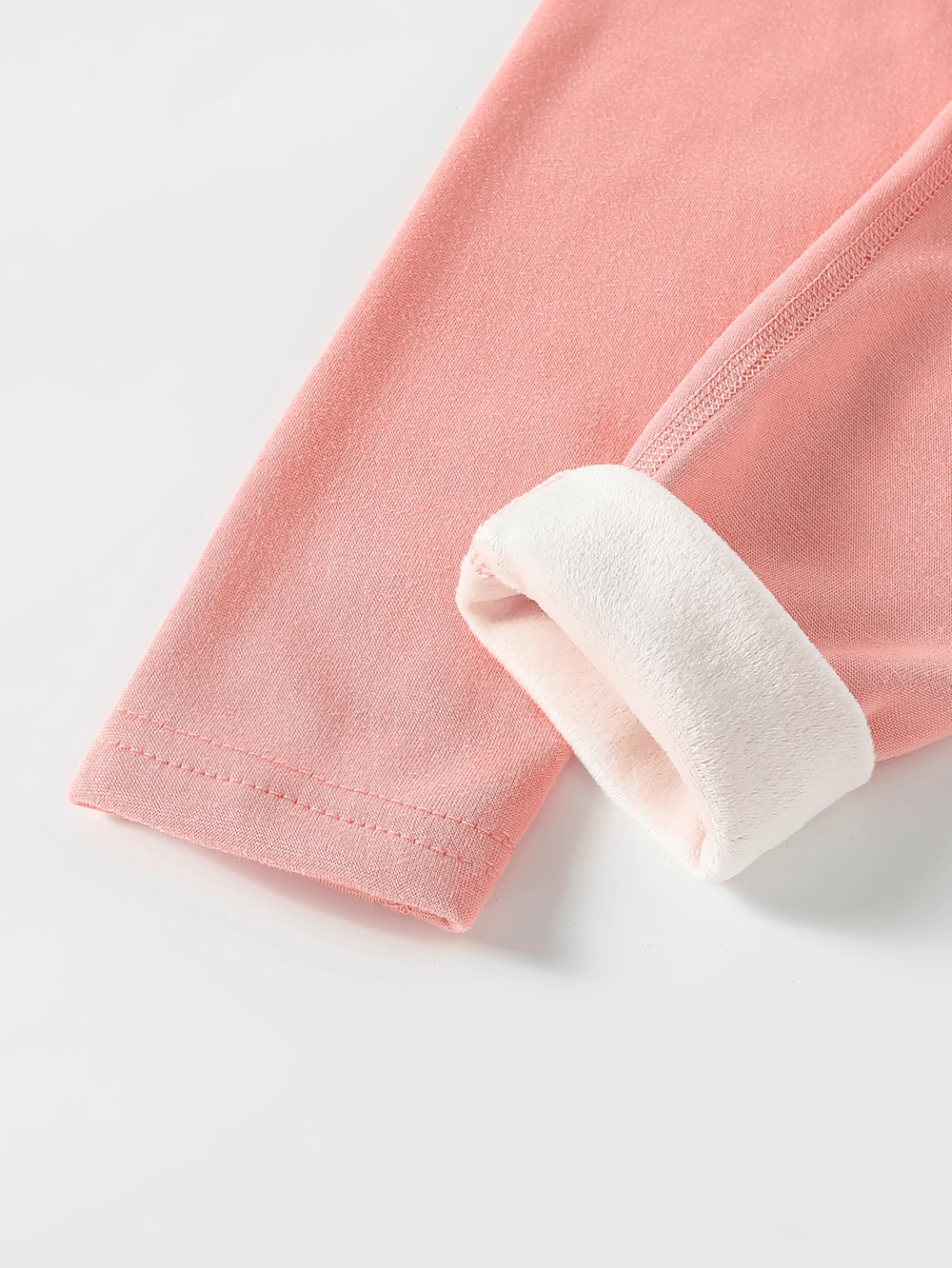 Close-up of pink Girls Fleece Leggings for Sports and Casual Wear - SF3660, showing soft fleece lining and detailed stitching.