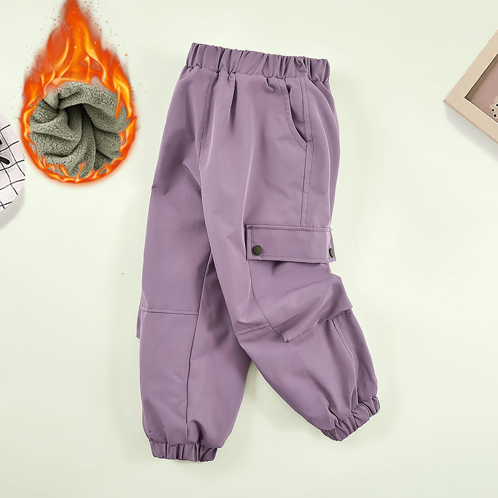 Girls Fleece-Lined Cargo Pants with Pockets - SF3708 in purple, showcasing the windproof and waterproof design for winter adventures.