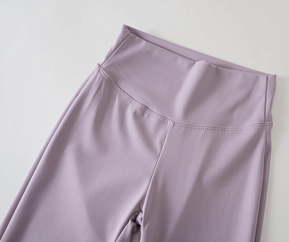 Close-up of Girls High Waist Flared Leggings for Training - SF3817 in light purple color, showing the sleek and durable waistband design.