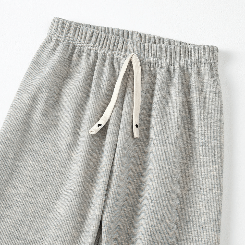 Close-up of Girls Plush Lined Sport Jogger Pants With Bow - SF3875 showing rib knit texture and elastic waist with drawstring.