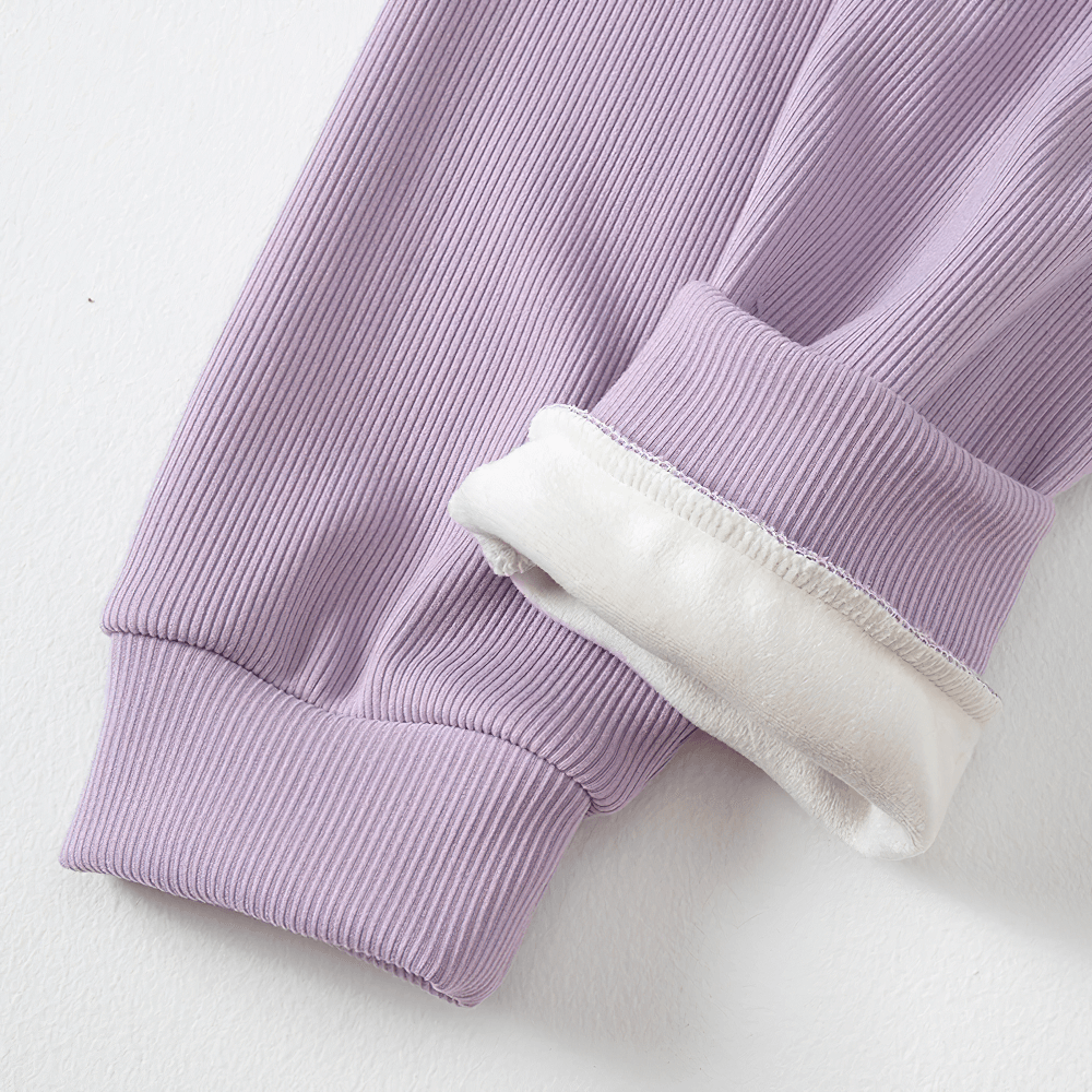 Close-up of Girls Plush Lined Sport Jogger Pants With Bow - SF3875; rib knit and plush lining detail.