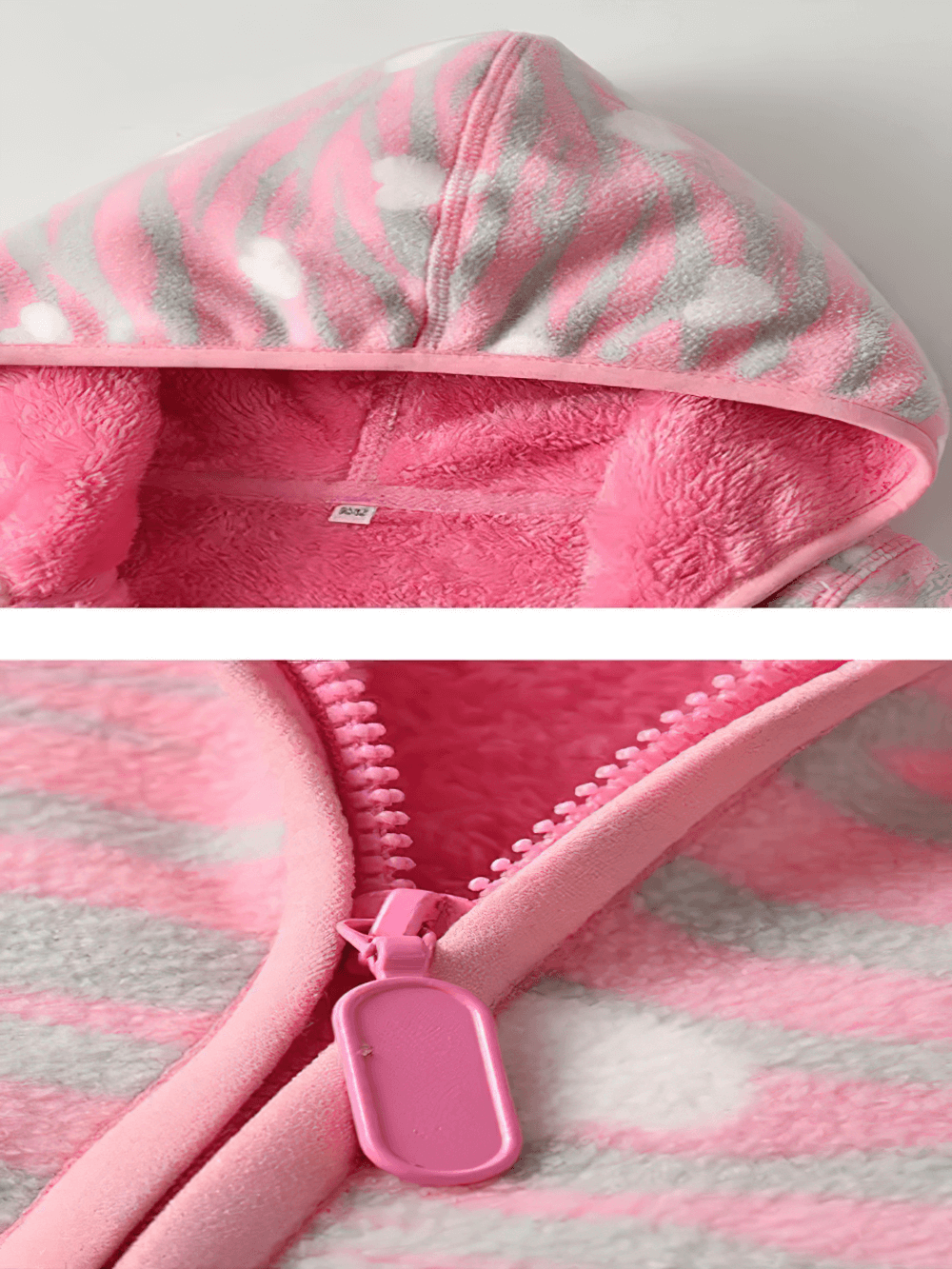 Close-up of Girls Printed Fleece Jacket with Hood - SF3573 showing pink floral pattern and zipper detail.