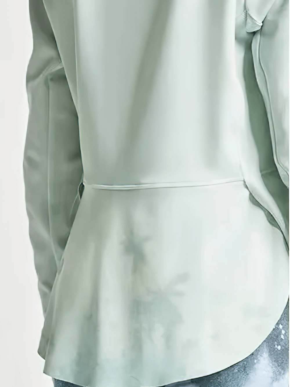 Close-up of green Girls Quick Dry Long-Sleeved Sports Top for Yoga - SF3859, highlighting the crossed hem design ideal for active kids.