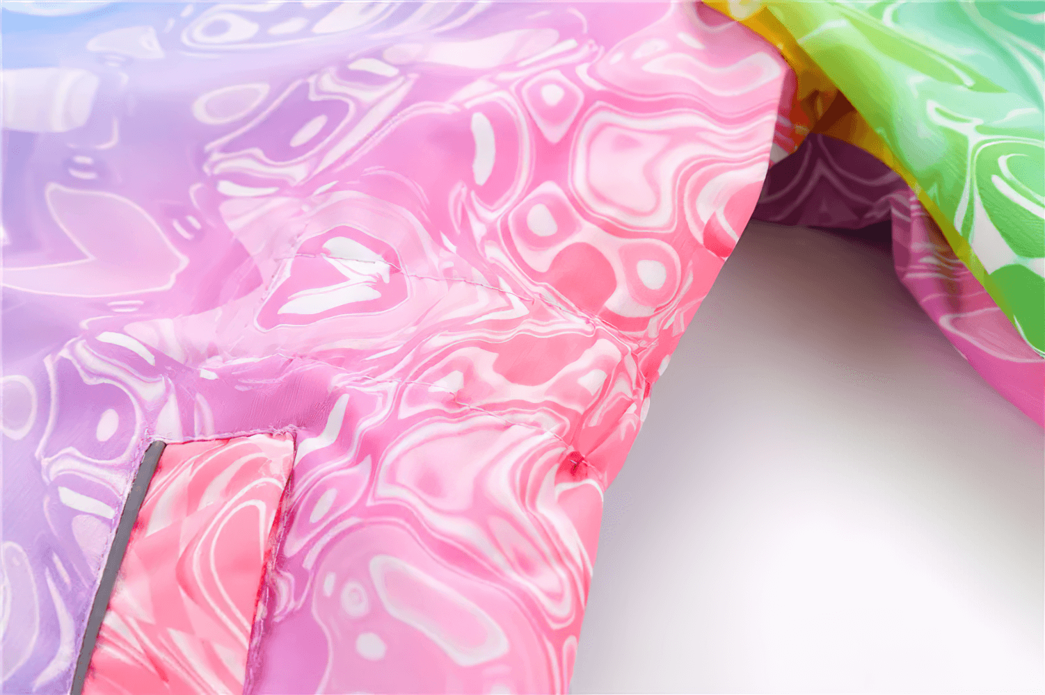 Close-up of the vibrant Girls Rainbow Gradient Windproof Hooded Jacket - SF3841 with colorful design and water-resistant fabric.