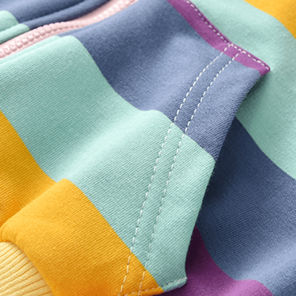 Colorful fabric detail of Girls Rainbow Stripe Zip Hoodie with Pockets - SF3598, featuring vibrant stripes in blue, green, and yellow.