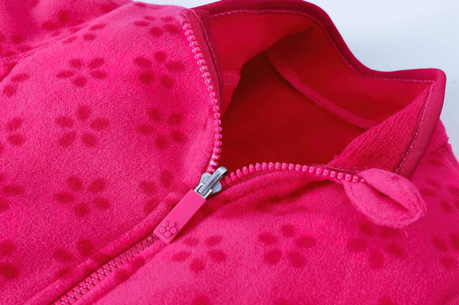 Girls Rose Red Fleece Zip Jacket with Pockets - SF3530, close-up of soft pink fleece texture and zipper design for kids.